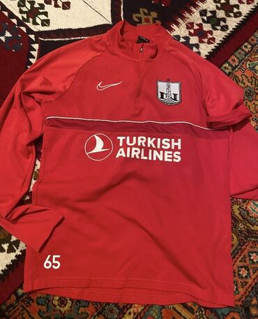 uzun pencekler: Məhsul: Futbol məşq üstü (Nike) - Rəng: qırmızı - Brend: Nike (sinədə