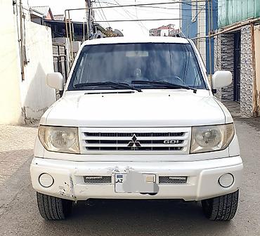 pajero tekeri: Mitsubishi Pajero iO 4WD – ağ rəngli, kompakt off-road SUV Maşına — 1