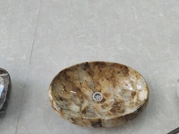 metbex canagi: Oval formalı, qəhvəyi və ağ rənglərdə olan bu əl yuyucusu hər bir