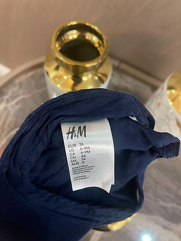 oğlan paltarı: 1ci papaq H&M firmasidir. 6/7 aya kimi. ikinci papaq Disneyindir — 2