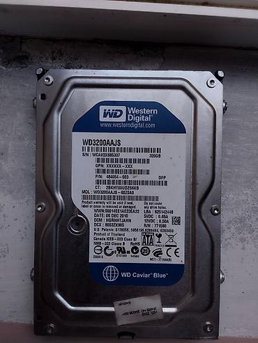 kohnə komputer: Western Digital WD Caviar Blue daxili sərt disk (HDD) satılır. Əsas — 1
