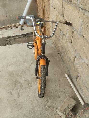 Uşaq velosipedləri: Uşaq velosipedi – narıncı rəng - Ölçü: təxminən 16" təkərlər (uşaqlar — 1