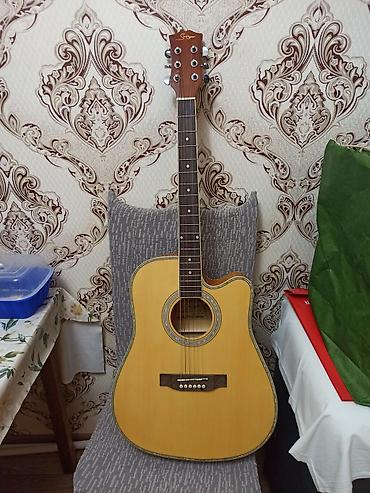 Gitaralar: Smiger Gah61n Akustik gitara satılır. Az istifadə olunub. Sınığı — 3