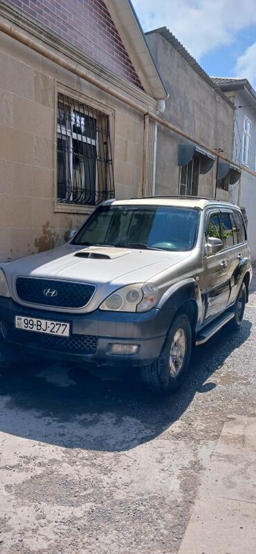aston martin db7 5.9: Hyundai Terracan: 2.9 l | 2004 il Ofrouder/SUV