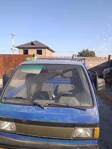 китайские грузовики: Компактный малотоннажный грузовик с открытым бортовым кузовом и — 4