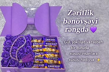 muncuğ: Bənövşəyi zəriflikdə hədiyyə qutusu Tərkib: - Bənövşəyi güllər — 1