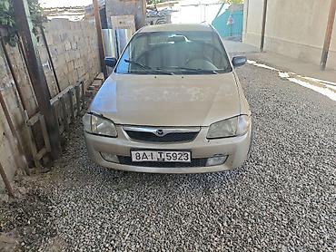 m5 e60 v10: Mazda 323: 2000 г., 1.6 л, Автомат, Бензин, Хэтчбэк — 1