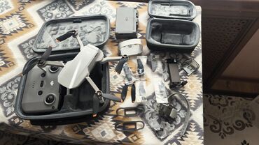 Дроны: DJI mini 2 дрон комплект на фото 2 батарейки, но одна вздулась