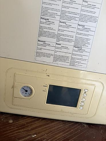 12 volt 220: Termogas divar tipli qaz qazanı - İdarə paneli: LCD ekran, ON/OFF — 1
