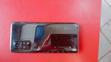 telefonların: Xiaomi Mi 10T, 128 GB, rəng - Gümüşü, 
 Sensor, Barmaq izi, Simsiz şarj