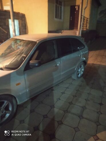 Mazda: Mazda 323: 2003 г., 1.6 л, Механика, Хэтчбэк — 8