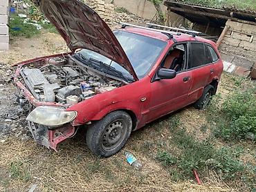rox 01: Mazda 323: 2003 г., 1.6 л, Механика, Бензин, Универсал — 1
