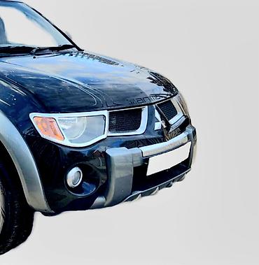 bufer: Ön, Mitsubishi L200 — 2