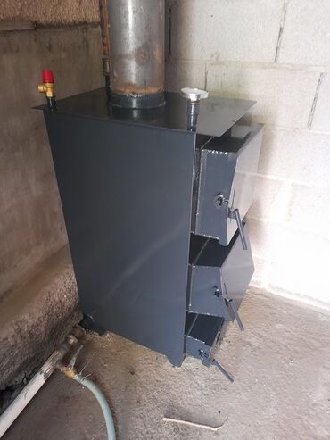 Котлы: Твердотопливный водогрейный котёл с варочной поверхностью Описание: - — 8