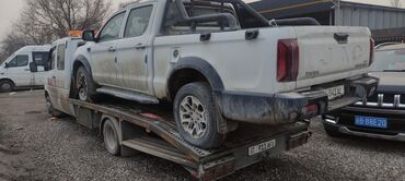 Услуги эвакуатора: С лебедкой, С ломаной платформой — 2