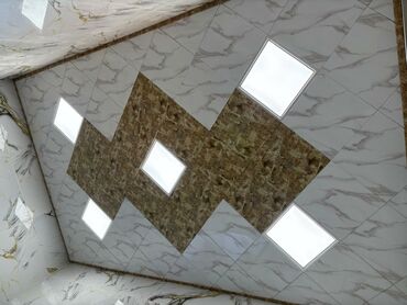 Asma tavanlar: Asma tavan panelləri və LED işıqlandırma sistemi - Material: mərmər