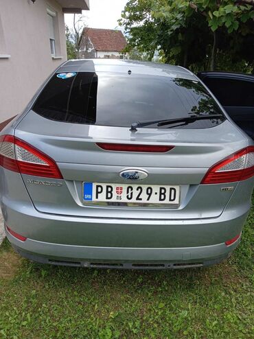 Ford: Ford Mondeo – dizel TDCi, sivi metalik. Karoserija: liftback sa 5 — 3