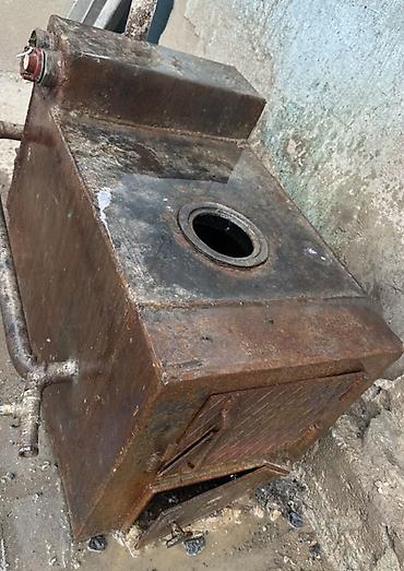 кухонные посуды: Металлическая печь-варочная (буржуйка) с водяной «рубашкой» Описание — 2