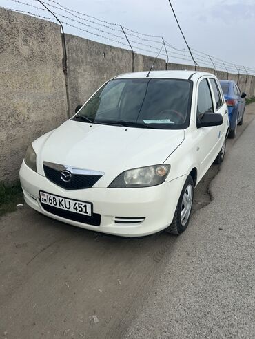 белый bmw: Mazda 2: 2005 г., 1.3 л, Механика, Бензин, Хэтчбэк