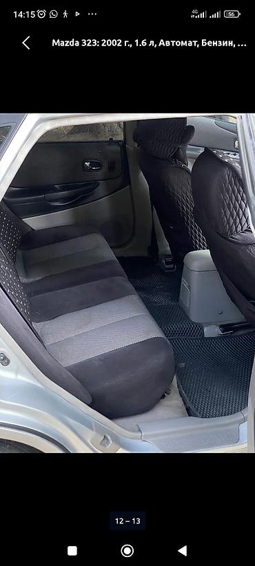 byd e1: Mazda 323: 2002 г., 1.6 л, Автомат, Бензин, Универсал — 9