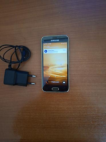 Ocuvan samnsung s 5 mini sa punjacem radi na sve mreze . zamena ya
