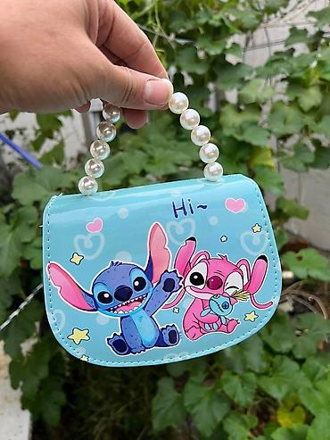 Rančevi, torbe i koferi: Torbice 1500

00din — 3