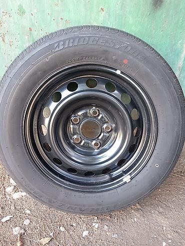 teker dolduran: Məhsul: Avtomobil təkərləri (2 model) 1) Bridgestone Turanza T005 - — 5