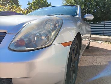крепление для телефона в машину: Nissan Skyline: 2003 г., 2.5 л, Автомат, Бензин, Седан — 10