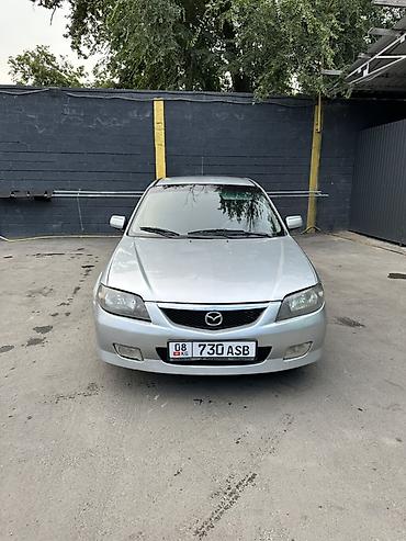 Mazda: Mazda 323: 2004 г., Хэтчбэк — 1