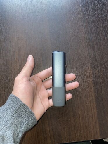 Qəlyan, vayp və aksesuarları: IQOS cihazı – tütün çubuqlarını qızdırmaq üçün portativ elektron
