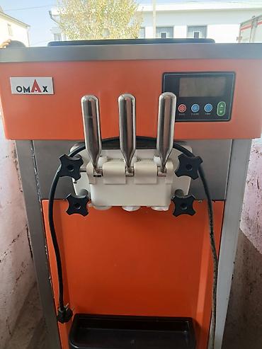Фризер для мягкого мороженого OMAX. - Три рычага раздачи: два