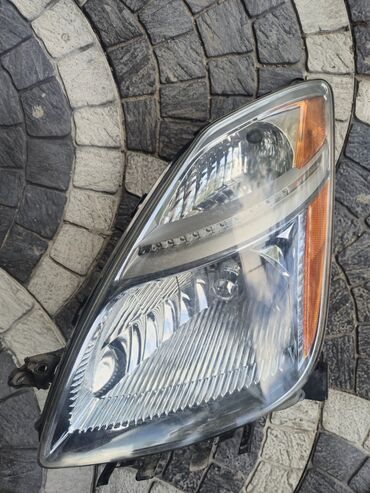 Radiatorlar: Prius 20 kuza sol fara orginal üstdən çıxma.
ksenondur
