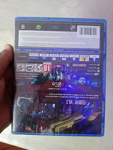 ucuz playstation 4 oyunları: Çagarası üzərində yeni bağlı qutuda resident evil 3 disk satılır — 3