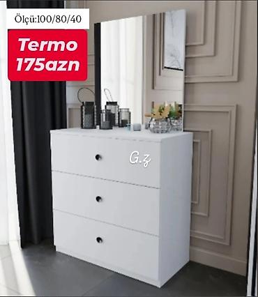 Komodlar: Ağ rəngdə minimalist komod və güzgü dəsti. Xüsusiyyətlər: - Material — 1
