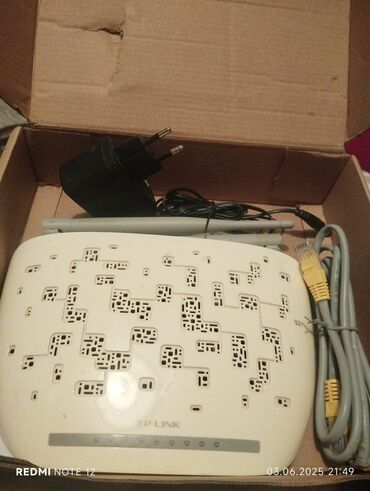 Modemlər və şəbəkə avadanlıqları: TP-Link şirkətinin simsiz marşrutizatoru (router). Ağ rəngdədir və lalafo.az -da Modemlər və şəbəkə avadanlıqları: TP-Link şirkətinin simsiz marşrutizatoru (router). Ağ rəngdədir və