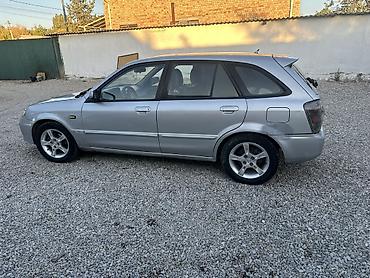 Mazda: Mazda 323: 2002 г., 1.6 л, Механика, Бензин, Универсал — 5