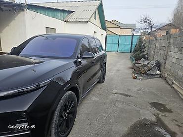 Другой тюнинг: Черный кроссовер/внедорожник премиум-класса, полностью в темном стиле — 2