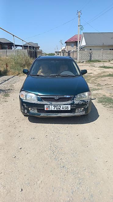 mazda d: Mazda Familia: 2002 г., 1.5 л, Механика, Бензин, Универсал — 1