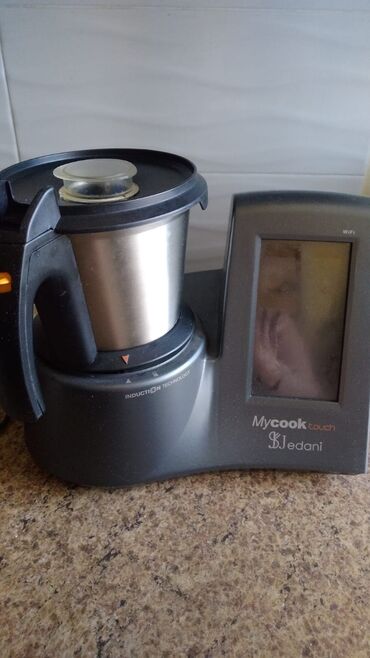 электро терка: Кухонный робот Майкук готовит практически все: нарезает, жарит, варит