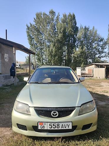 мата секыл: Mazda 323: 2000 г., 1.6 л, Автомат, Бензин, Седан — 1