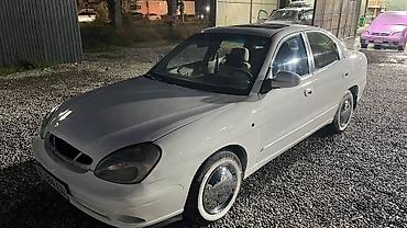 предлогайте варианты: Daewoo Nubira: 2000 г., 1.5 л, Механика, Бензин, Седан — 4