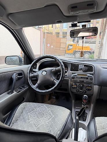 продаю с: Nissan Primera: 2001 г., 2 л, Механика, Бензин, Универсал — 10