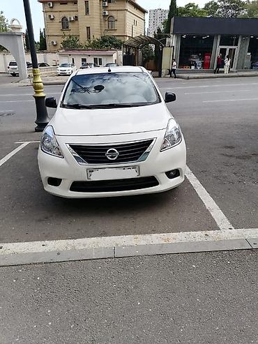 Nissan Sunny: 1.5 l | 2013 il Sedan
