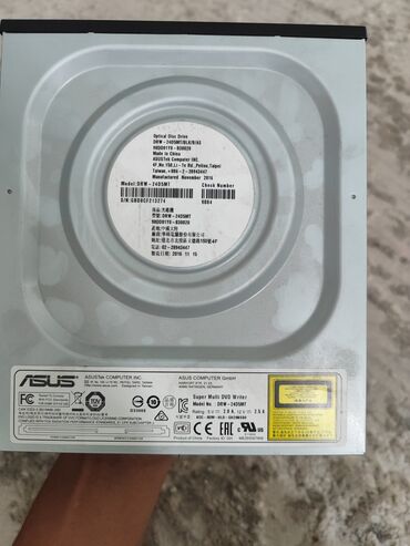 комплектующие: Оптический привод ASUS Super Multi DVD Writer, модель DRW-24D5MT