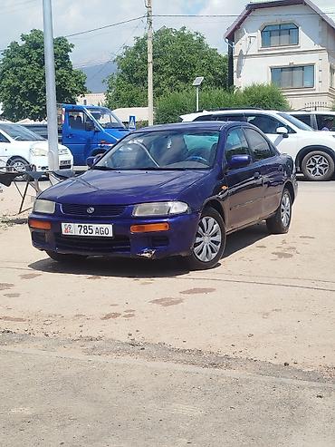car kg: Mazda 323: 1996 г., 1.5 л, Механика, Седан — 1