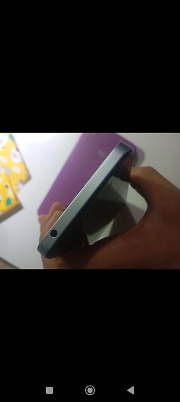 хиоми 13: Смартфон Redmi (серия Note/номер не указан) в голубом цвете с — 4