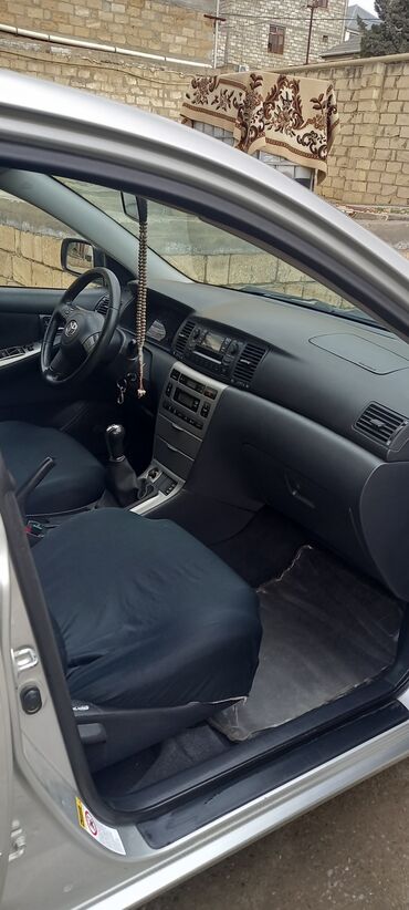 Toyota: Toyota Corolla hatchback (E12) – gümüşü rəng. - Kuzov: 5 qapılı — 9