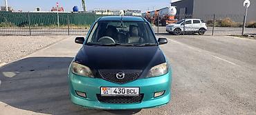 калганы: Mazda Demio: 2003 г., Автомат, Бензин — 2