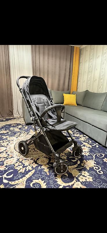 Коляски: Коляска (черная), складная Особенности: - Легкая алюминиевая рама — 7