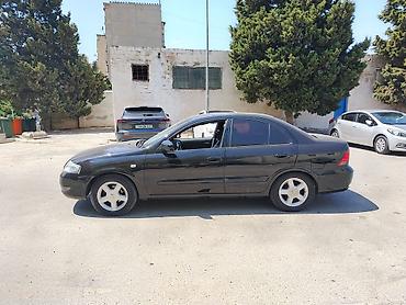 Транспорт: Nissan Sunny: 1.6 л | 2008 г. Седан — 3